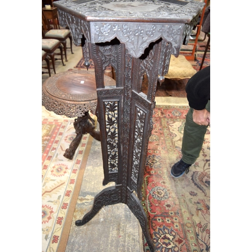 3125 - Ornately carved Middle Eastern Pot Stand with foliage pattern.  129cm x 42cm