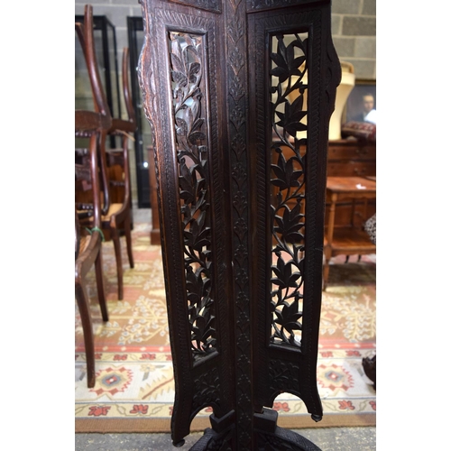 3125 - Ornately carved Middle Eastern Pot Stand with foliage pattern.  129cm x 42cm