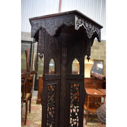 3125 - Ornately carved Middle Eastern Pot Stand with foliage pattern.  129cm x 42cm