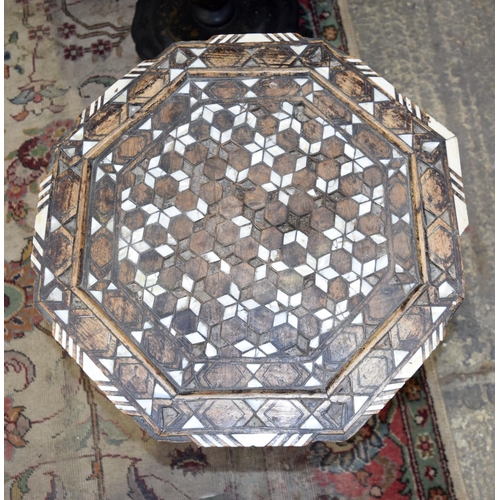 3126 - Ornately carved Syrian Table inset with mother of pearl and a Lacquer Table.  66cm x 65cm. (2)