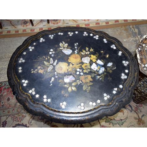 3126 - Ornately carved Syrian Table inset with mother of pearl and a Lacquer Table.  66cm x 65cm. (2)