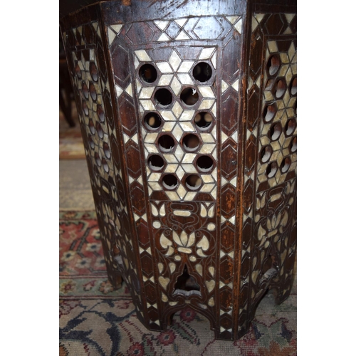 3126 - Ornately carved Syrian Table inset with mother of pearl and a Lacquer Table.  66cm x 65cm. (2)