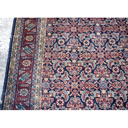 3143 - A Turkman red ground rug.  190cm x 140cm