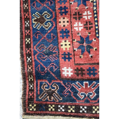 3144 - An Antique Caucasian Talish red ground rug.  330cm x 163cm