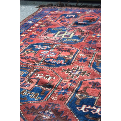 3144 - An Antique Caucasian Talish red ground rug.  330cm x 163cm