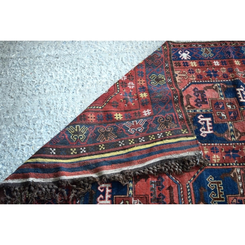 3144 - An Antique Caucasian Talish red ground rug.  330cm x 163cm