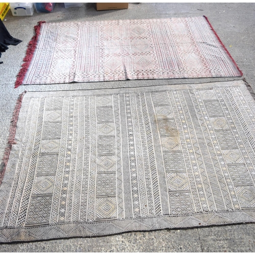 3145 - Two wool rugs.  290cm x 190cm