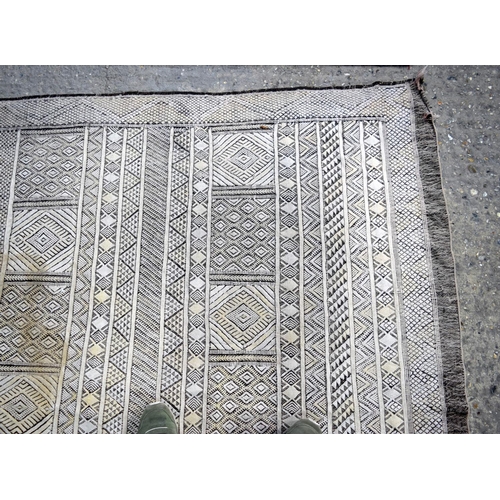 3145 - Two wool rugs.  290cm x 190cm