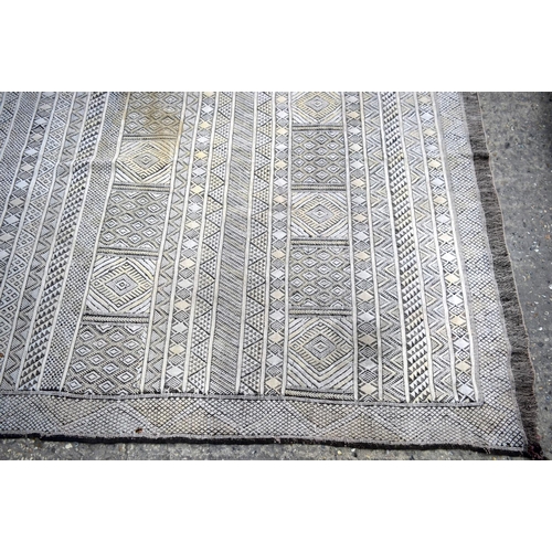 3145 - Two wool rugs.  290cm x 190cm