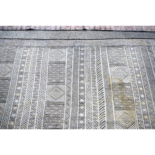 3145 - Two wool rugs.  290cm x 190cm