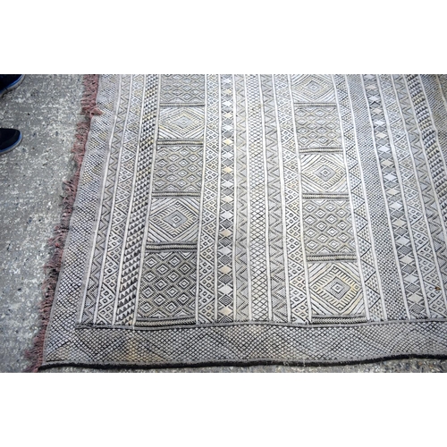 3145 - Two wool rugs.  290cm x 190cm