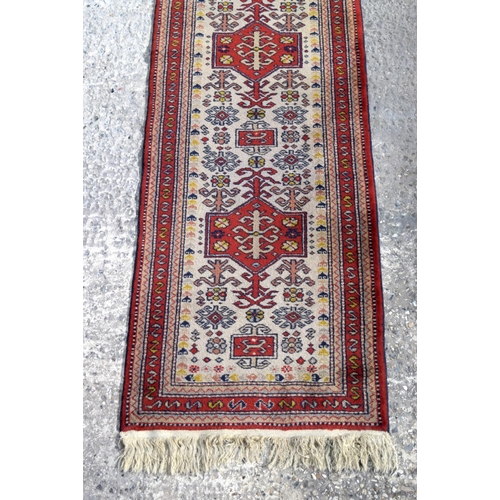 3154 - A Persian runner.  353cm  x 74cm