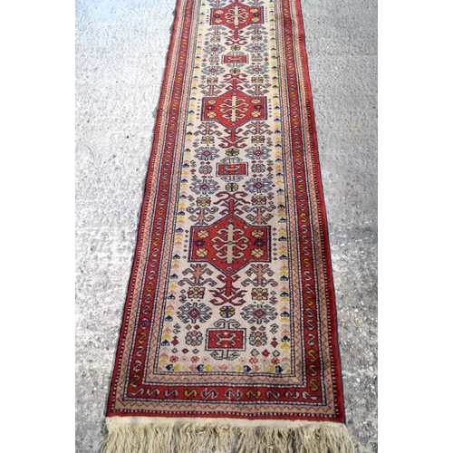 3154 - A Persian runner.  353cm  x 74cm