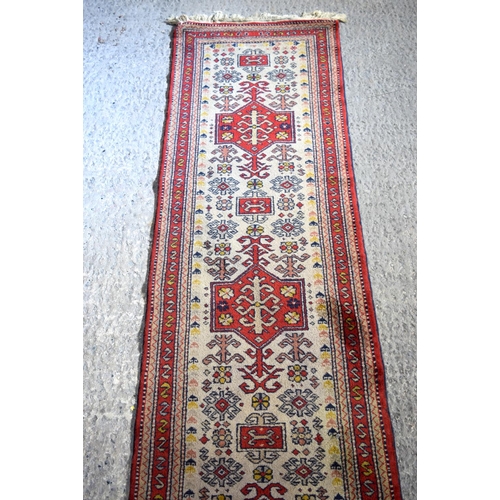 3154 - A Persian runner.  353cm  x 74cm