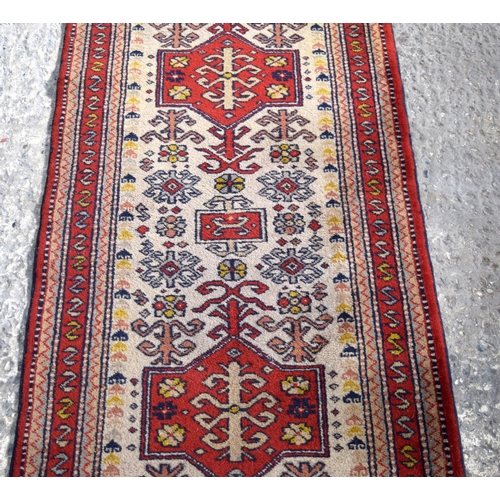 3154 - A Persian runner.  353cm  x 74cm