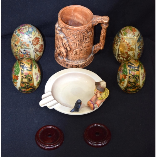 3165 - A group of oriental eggs, pottery tankard etc