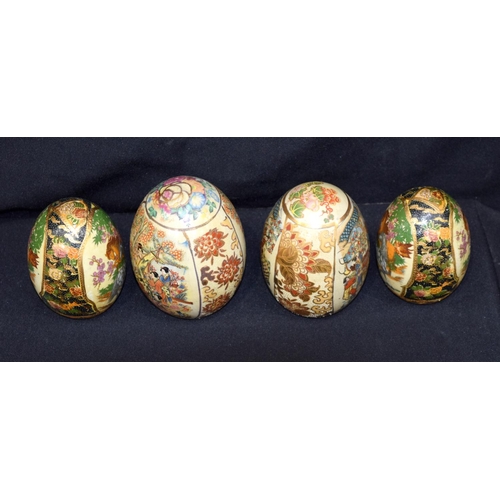 3165 - A group of oriental eggs, pottery tankard etc