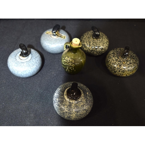 3166 - Group of novelty whisky containers in form of curling stones, jug (6)