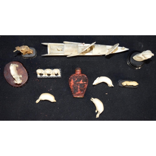 3190 - Group of ivory figures and a Cinnabar snuff bottle