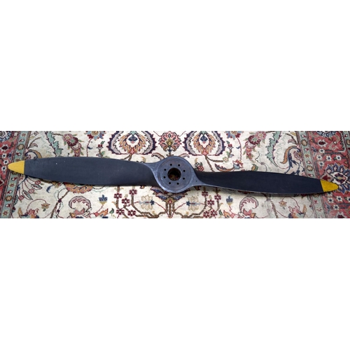 3214 - A vintage wooden propeller.  200cm long