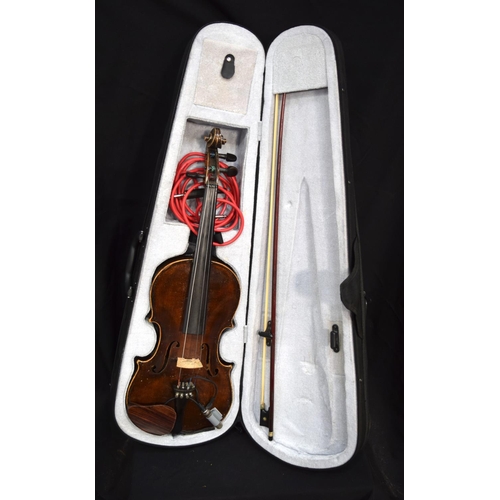 3216 - A cased Violin with amplification fittings