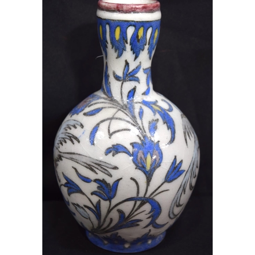 3222 - A Persian Qajar vase decorated with birds and foliage.  23cm