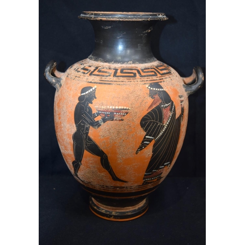 3223 - A  Roman style Terracotta twin handled vase.  32cm