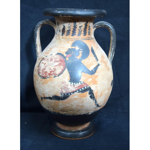 3224 - A  Roman style Terracotta twin handled vase.  24cm