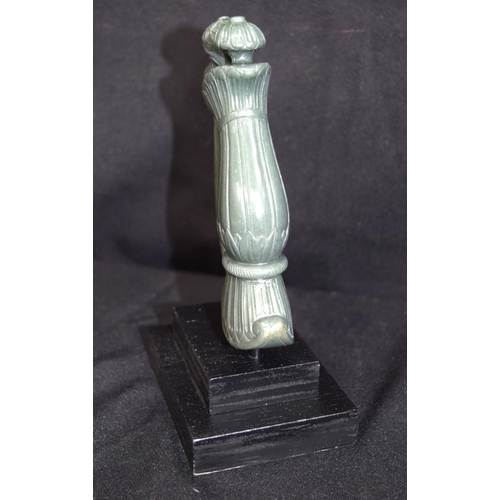 3226 - An Indian Jade dagger handle mounted on plinth. 15cm