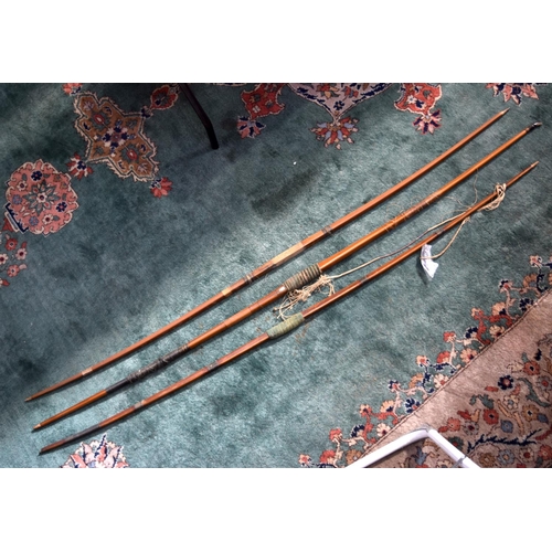 3235 - Three early 20th Century Archery bows.  largest 187cm long