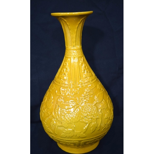 3242 - Chinese yellow ground Pear shaped Vase decorated with animals and birds.  38cm high