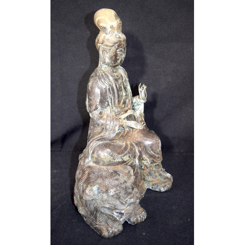 3244 - Chinese bronze Buddha seated on a beast.  Buddha 28cm high