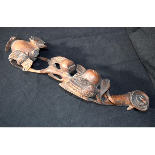 3249 - A Chinese carved wooden Ruyi Sceptre.  42cm long