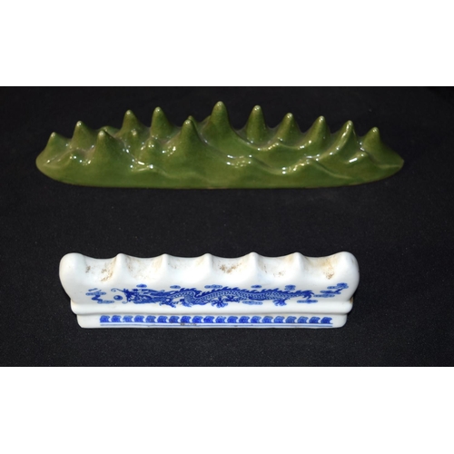 3250 - Two porcelain Chinese brush rests.  largest 26cm long