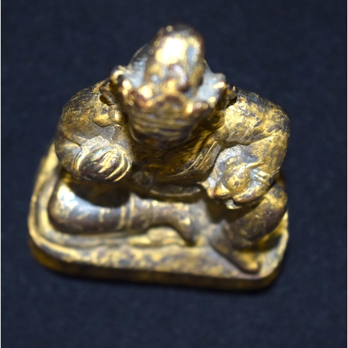 3273 - A Tibetan metal Gilt statue 10cm