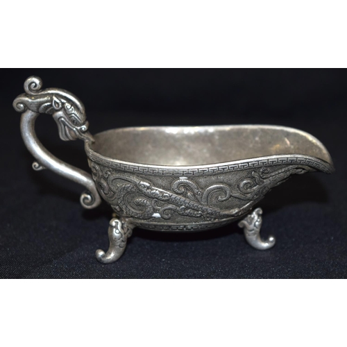 3279 - A Chinese white metal dragon Sauce Boat.  13cm