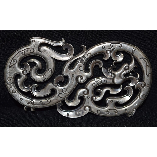 3282 - A Chinese white metal dragon Plaque.  11cm x 6 cm