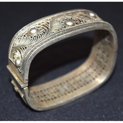 3291 - A Chinese white metal bracelet 7cm X 6cm