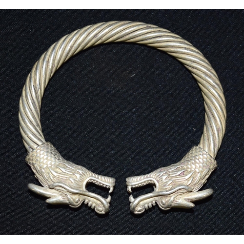 3294 - A Chinese white metal dragon bangle 9 x 9cm