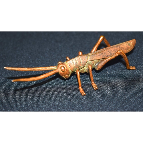 3320 - A small bronze Japanese  locust 13 cm