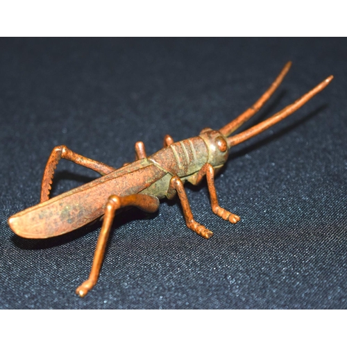 3320 - A small bronze Japanese  locust 13 cm