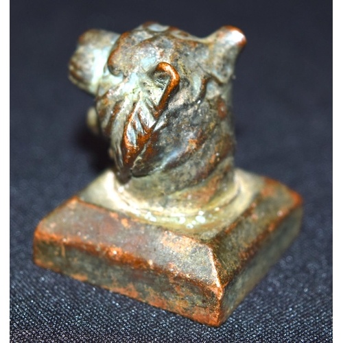 3331 - A small Chinese tigers head bronze seal 3 x 4cm