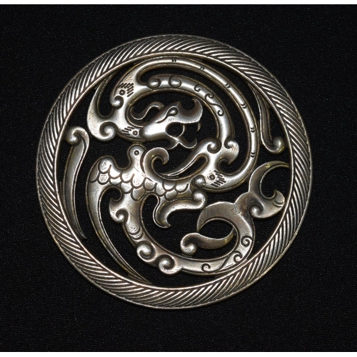 3335 - A Chinese white metal dragon plaque 8 cm