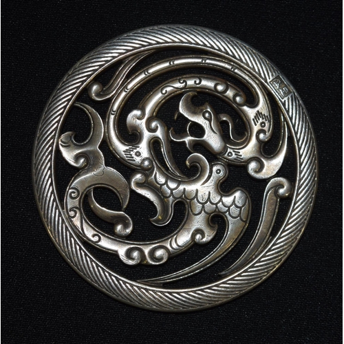 3335 - A Chinese white metal dragon plaque 8 cm