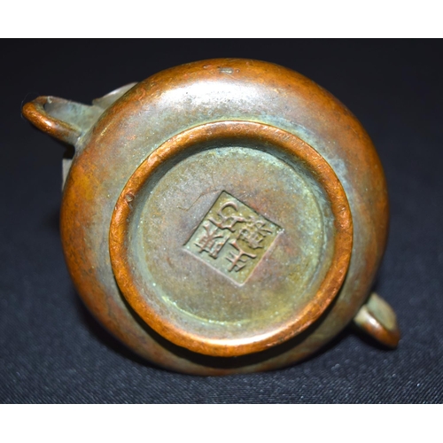 3363 - A Chinese bronze censor 7 x 4cm