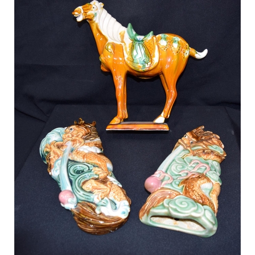 3377 - A  Chinese porcelain Tang horse and two Chinese dragon wall pockets