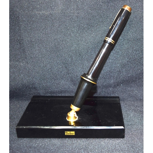 3389 - a Parker Duofold fountain pen together with matching stand