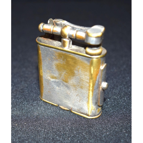 3393 - A vintage Dunhill lighter with side lock