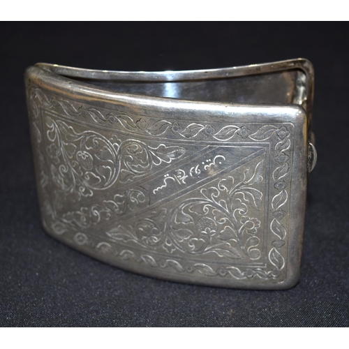 3398 - A Brunei silver breast pocket case engraved with flowers and leaves