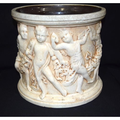 3409 - A Large Bretby pottery Jardiniere with cherubs moulded in classical style 27cm x 30cm